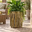 antique-gold-ribbed-cylinder-planter-covered-patio.webp