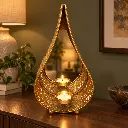 antique-gold-teardrop-mirror-candle-holder-sideboard.webp