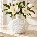white-round-textured-vase-with-flowers.webp