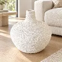 white-round-textured-vase-living-room.webp